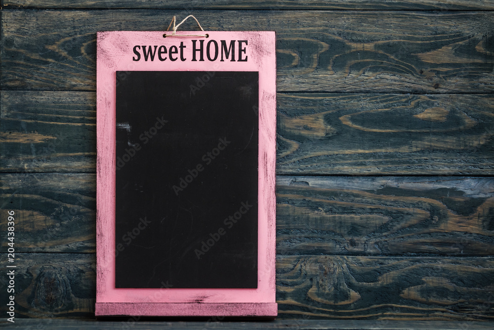 Obraz premium Blackboard with Text Sweet Home in Pink Wooden Frame