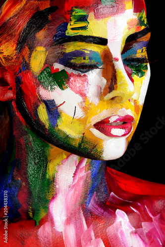 Obraz na plátne portrait of young woman in colourful paint