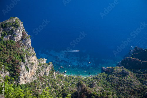 Scenic view of the dazzling Mediterranean blue waters from the dramatic clifftop mountain coastline of the island of Capri, Italy 