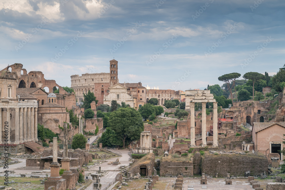 The Roman Forum, also known by its Latin name Forum Romanum, is a rectangular forum surrounded by the ruins of several important ancient government buildings at the center of the city of Rome