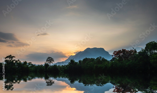 Fototapeta Naklejka Na Ścianę i Meble -  Nature Doi Luang Chiangdao reflection on water at sunrise time, Chiangdao Chiangmai Thailand.