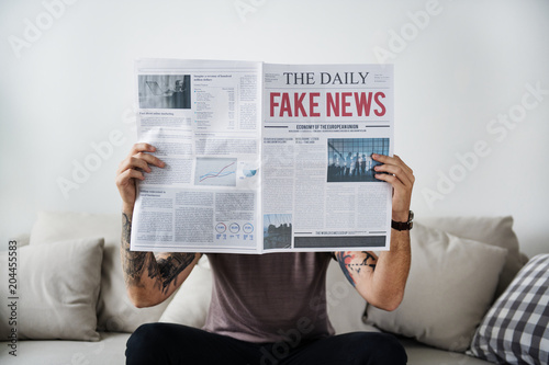 Fake news headline on a newspaper photo