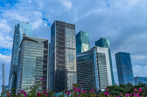 Modern office building on a clear sky background.