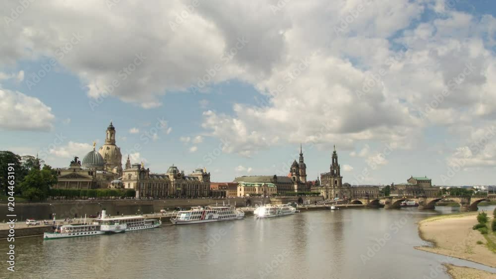 Dresden skyline time lapse, river bank with tourist boats leaving Dresden skyline time lapse, river bank with tourist boats leaving