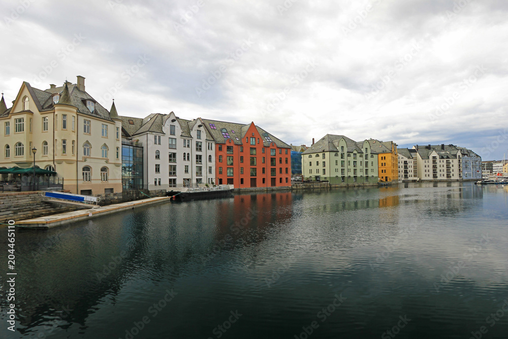Oceanfront with colorful houses, cityscape of beautiful Alesund, Norway, Europe