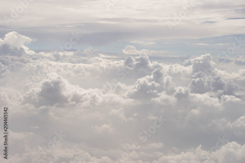 Beautiful clouds point of view On the plane window © akachai studio