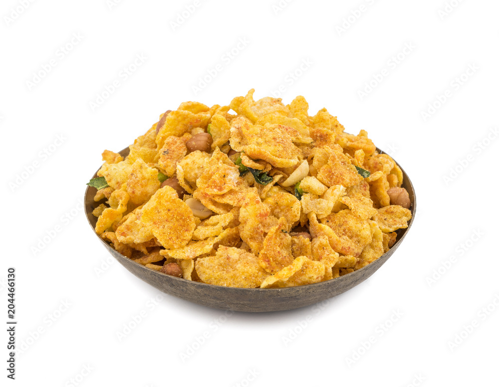 Indian Deep Fried Salty Dish Namkeen Called Namkin, Nimco, Chivda, Mixture or Farsan made of gram flour and mixed with dry fruits isolated on white background Indian Deep Fried Salty Dish Namkeen Called Namkin, Nimco, Chivda, Mixture or Farsan made of gram flour and mixed with dry fruits isolated on white background