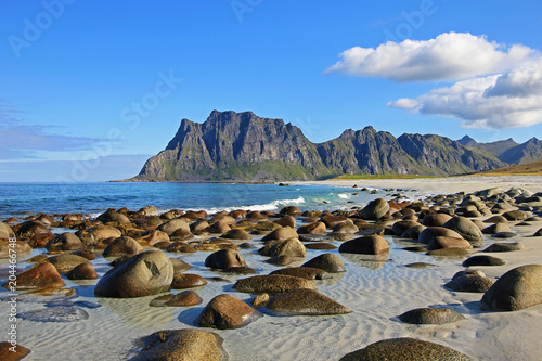 Beautiful pebble beach near Uttakleiv, with mountains in the background, Lofoten Islands, Norway, Scandinavia, Europe