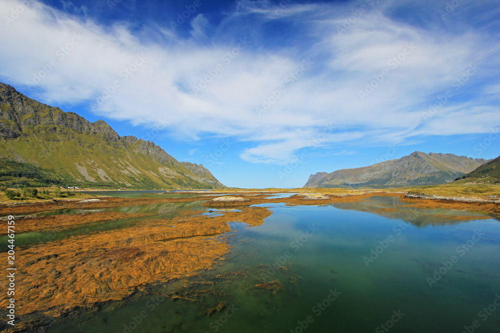 Mountain and fjord landscape, norwegian sea at Holandsmelen, Vestvagoy, Lofoten Islands, Scandinavia, Norway