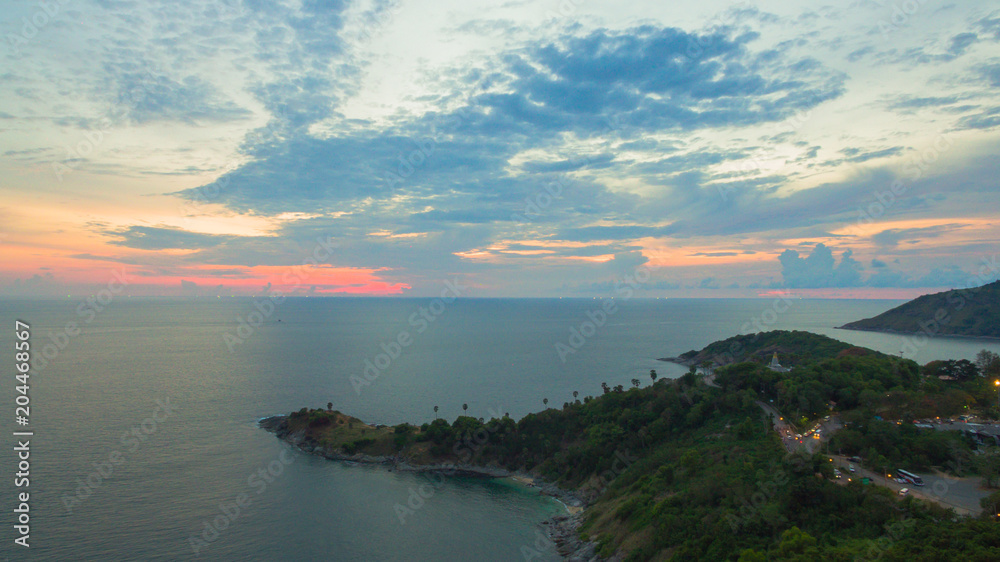 areial photography sunset at Promthep cape is the most popular viewpoint in Phuket. the most tourist always come to see sunset areial photography sunset at Promthep cape is the most popular viewpoint in Phuket. the most tourist always come to see sunset
