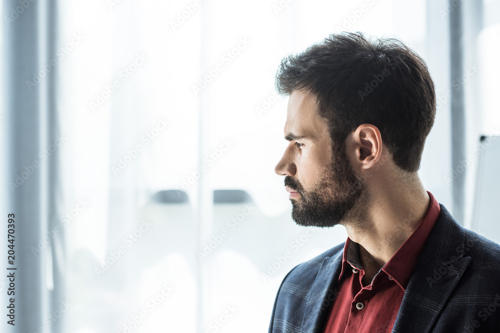 close-up portrait of thoughtful young businessman in stylish suit close-up portrait of thoughtful young businessman in stylish suit