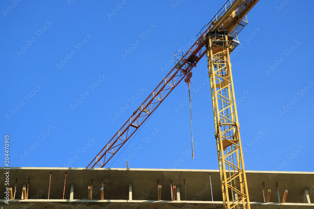 An image of a tower crane. An image of a tower crane.