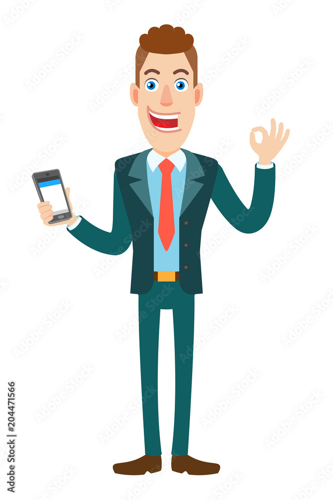 Fototapeta premium Businessman holding mobile phone and showing a okay hand sign