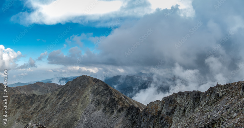 Cloudy Alpine Landscape