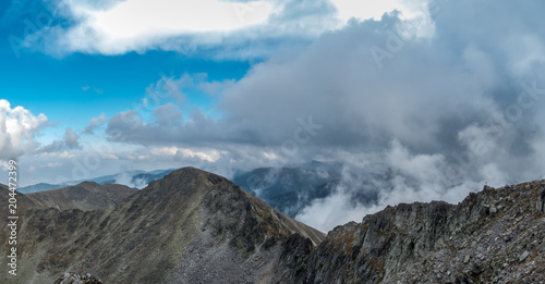 Fototapeta Naklejka Na Ścianę i Meble -  Cloudy Alpine Landscape