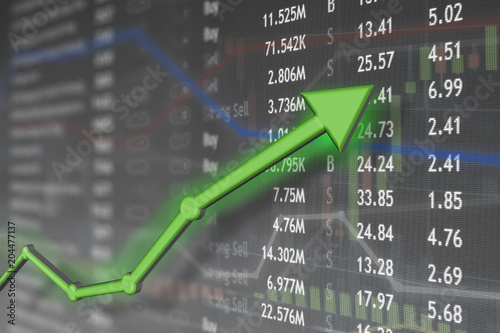 Investing and stock market concept gain and profits with faded candlestick charts.