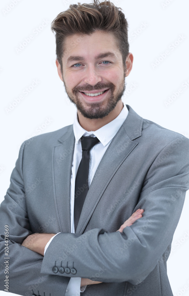 Joyful businessman looking at camera with smile Joyful businessman looking at camera with smile