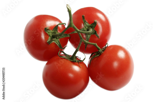 fresh red tomatoes isolated on white background
