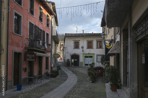 Fototapeta Naklejka Na Ścianę i Meble -  CASTELNUOVO DI GARFAGNANA, ITALY - FEBRUARY 2018;A street in Castelnuovo Di Garfagnana, Italy