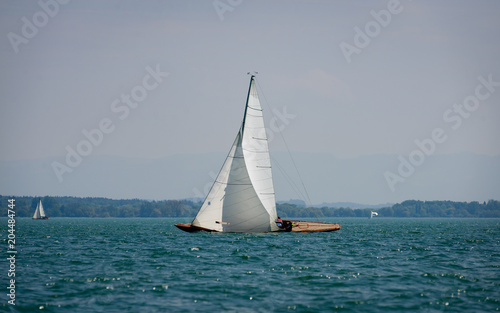 Classic sailing boats racing at a regatta at lake constance © C@rsten