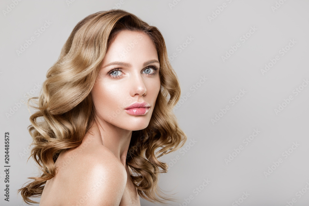 Beauty portrait of model with natural make-up. Fashion shiny highlighter on skin, sexy gloss lips make-up Beauty portrait of model with natural make-up. Fashion shiny highlighter on skin, sexy gloss lips make-up