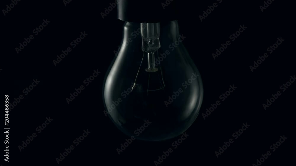 Light bulb turning on. 4k Light bulb turning on. 4k