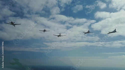 Five planes flying to the air show photo