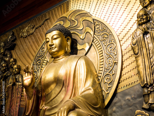 Guangzhou, CHINA-MARCH 27, 2018: Bodhisattva made of brass sheet, The bodhisattva of mercy and compassion.