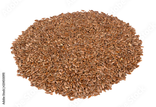 Linseed on a white background. Also known as Linseed, Flaxseed and Common Flax. Pile of grains, isolated white background.