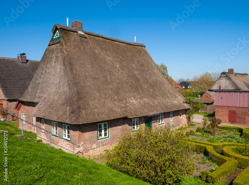 croft with thatch roof in Haseldorf, Niederlbe, Schleswig Holstein, Germany, Europe