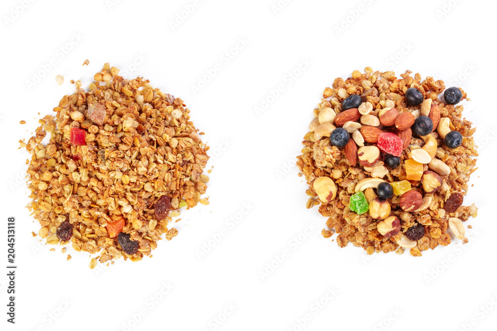 Granola with dried fruits isolated on white Granola with dried fruits isolated on white