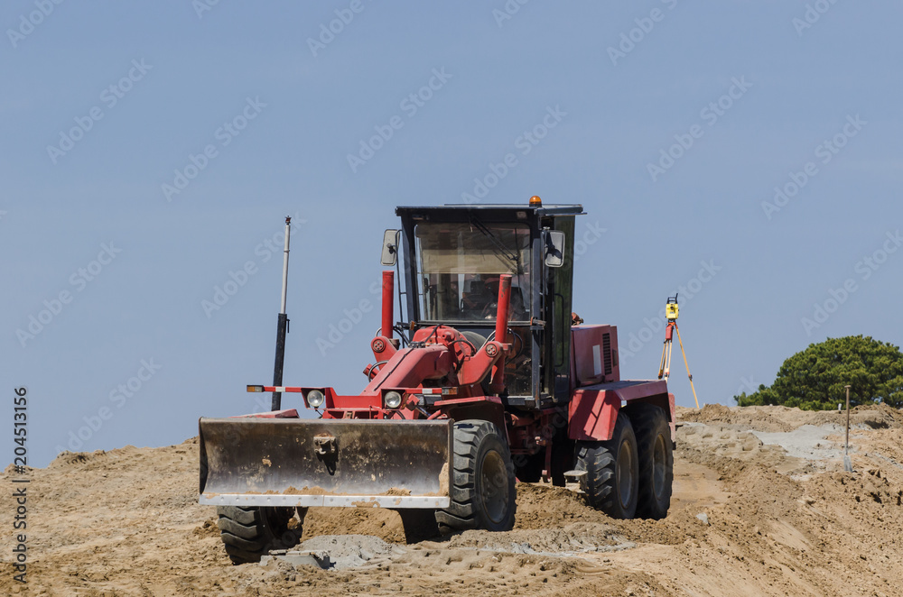 CONSTRUCTION MACHINE - The vehicle at work on construction site
CONSTRUCTION MACHINE - The vehicle at work on construction site