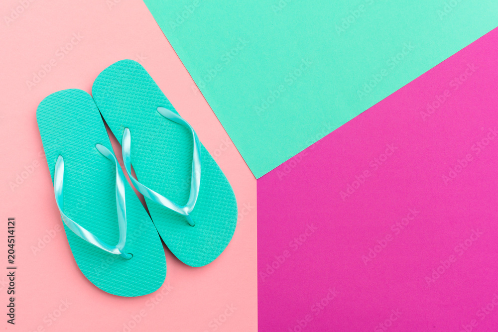 Female flip flops on a colorful vibrant background