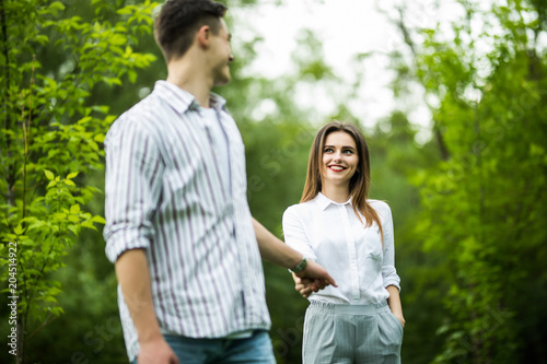 Romantic young couple walking and having fun in the park. © F8  \ Suport Ukraine