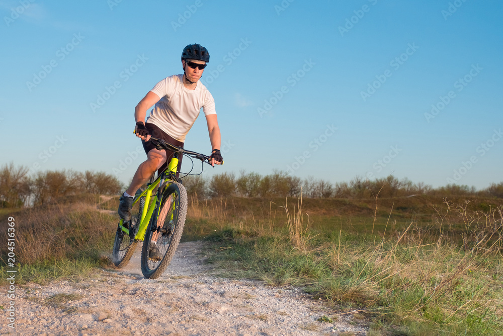 Extreme sports. Mountain bike and man.