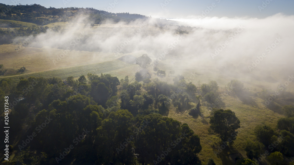 Aerial drone view of a foggy morning in the Scenic Rim, Queensland, Australia Aerial drone view of a foggy morning in the Scenic Rim, Queensland, Australia