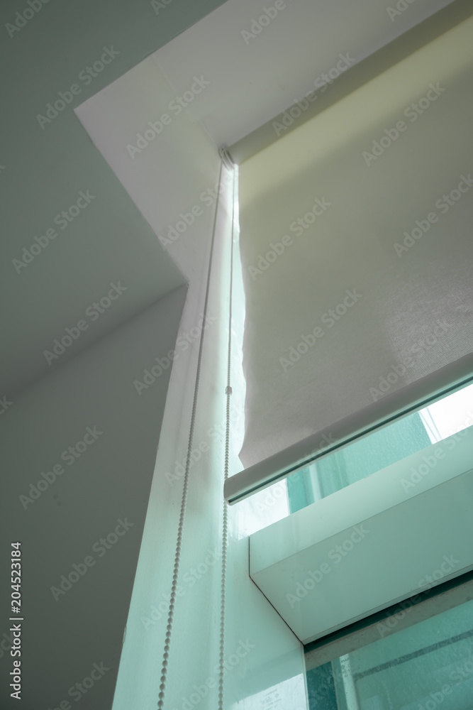 White curtain rail system with light curtain installed on ceiling White curtain rail system with light curtain installed on ceiling