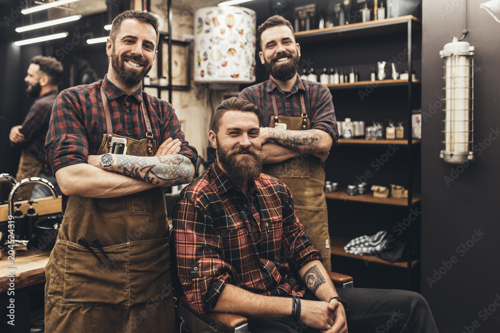 Hipster young good looking man visiting hairstylist and barber in barber  shop. Stock Photo | Adobe Stock