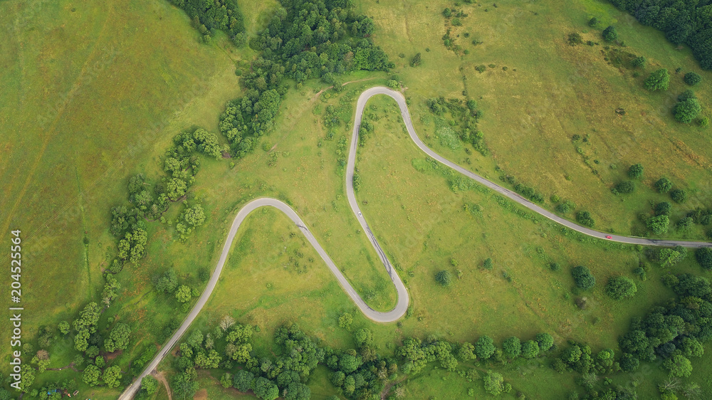 Obraz premium Aerial landscape- road between fields
