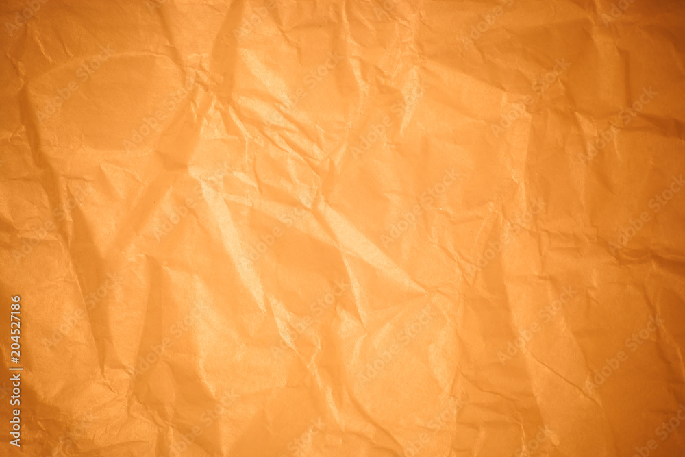 Obraz premium Brown crumpled paper background.