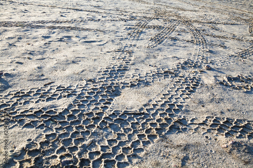Wheel tracks on the sand