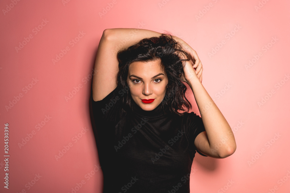 Portrait of youn women on pink background Portrait of youn women on pink background
