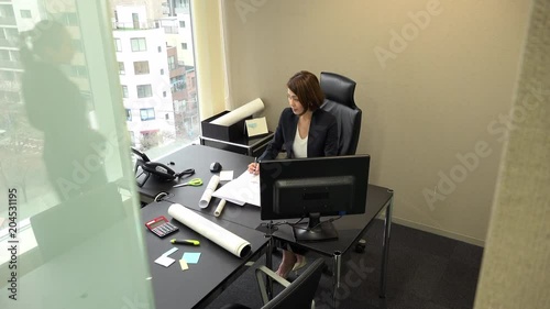 Wallpaper Mural Asian people at work in architect office. Japanese business women working in engineer studio. Team of businesswoman and assistant looking at house plans during meeting Torontodigital.ca