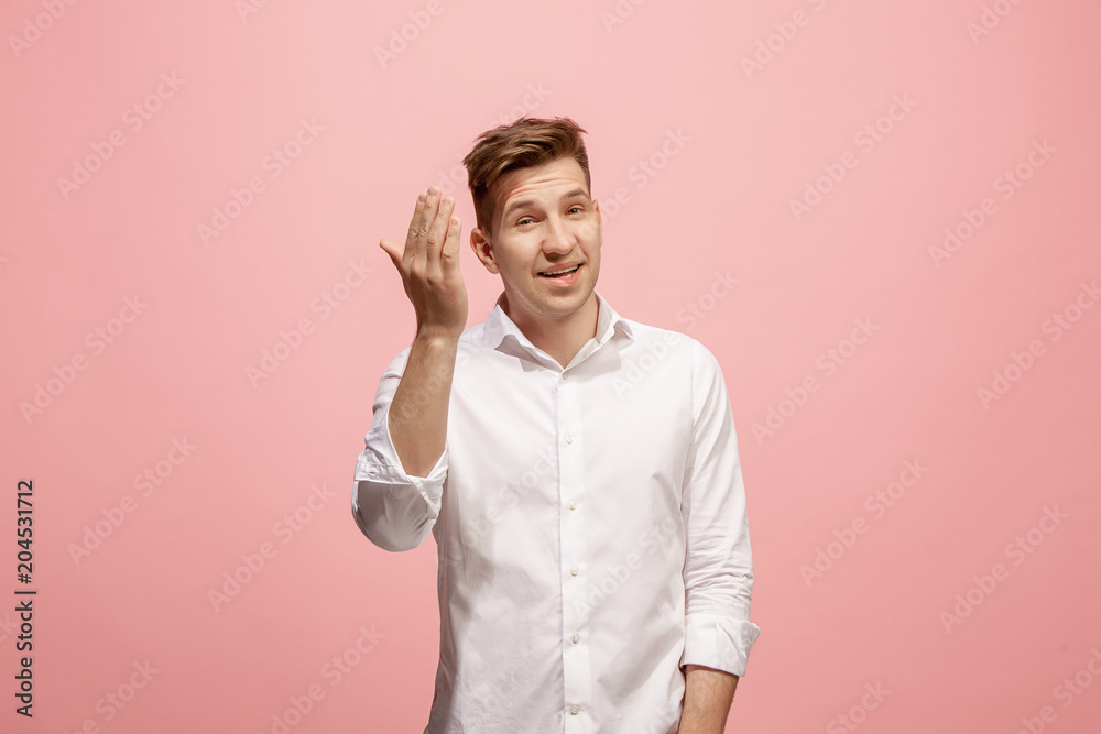 Isolated on pink young casual man shouting at studio Isolated on pink young casual man shouting at studio