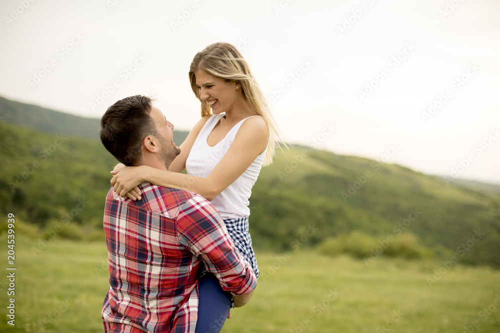 Loving coulpe having fun in the spring nature Loving coulpe having fun in the spring nature