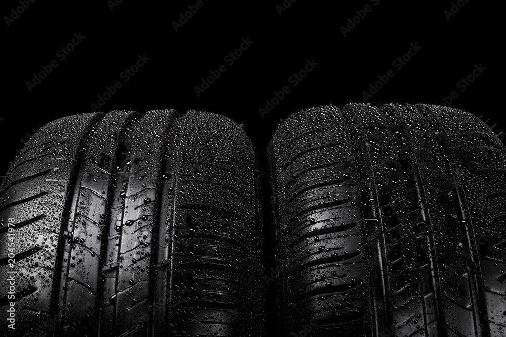 Car tyre isolated on a black background