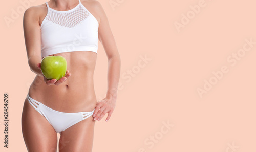 Slim and sporty female body, successful weight loss