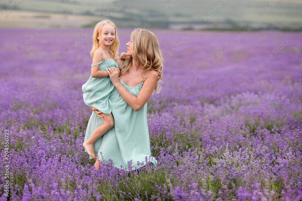 Happy family in a field of lavender Happy family in a field of lavender