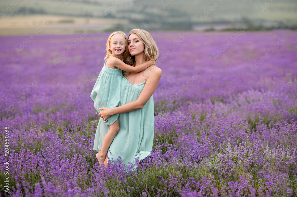 Happy family in a field of lavender Happy family in a field of lavender