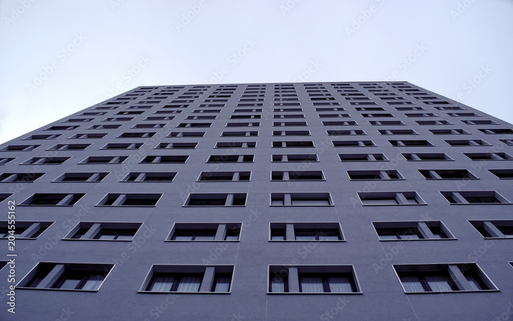 Buildings, construction, architecture and form concept: multi-storey apartment building, ideal and perfect arrangement of windows.Abstract concept. Buildings, construction, architecture and form concept: multi-storey apartment building, ideal and perfect arrangement of windows.Abstract concept.